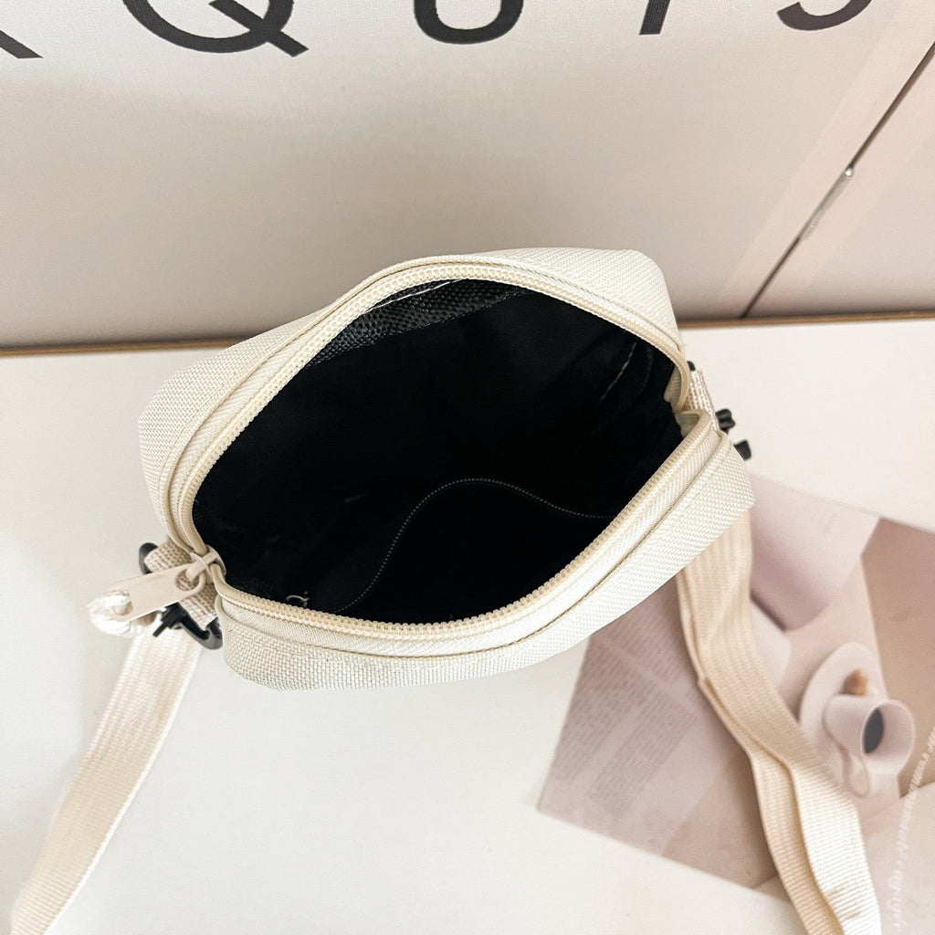Essential Compact Crossbody Bag